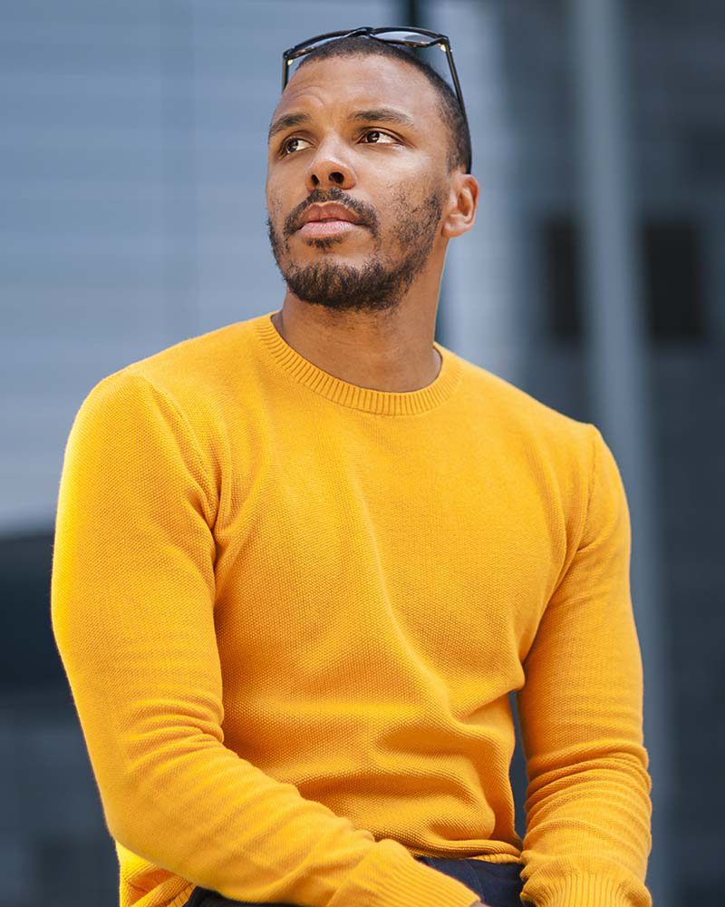 portrait-of-man-wearing-yellow-pullover-FFY3XUL.jpg